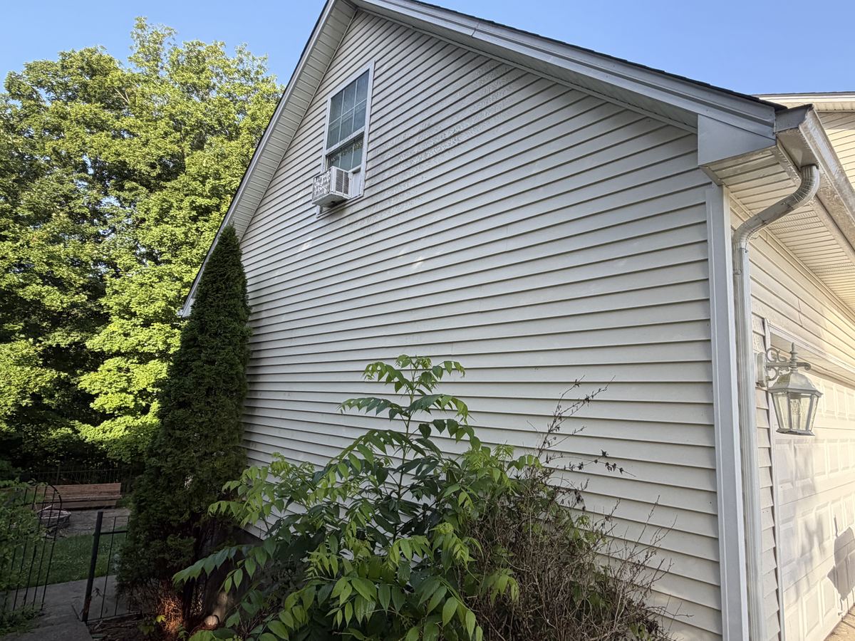 After — clean exterior surface after pressure washing
